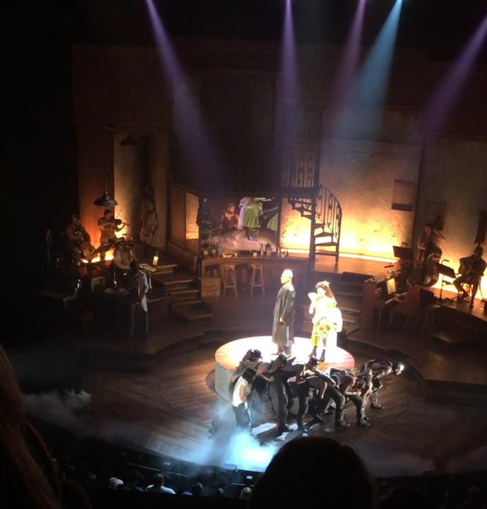 Persephone on how people are starving above, pointing to Eurydice